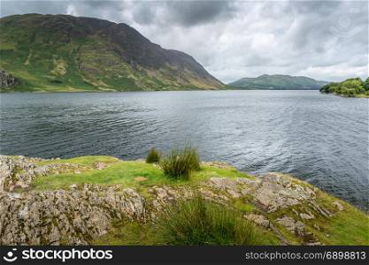 A landscape view of Crummock Water, one of the lakes in the Lake District, Cumbria, United Kingdom.