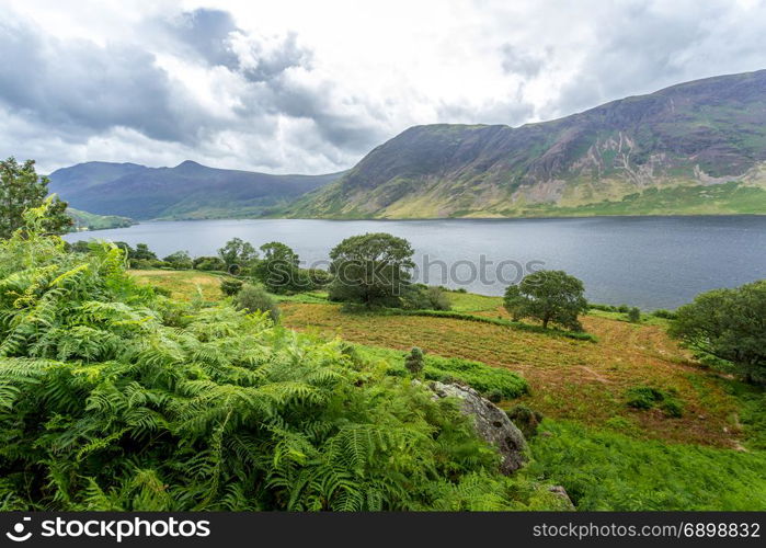 A landscape view of Crummock Water, one of the lakes in the Lake District, Cumbria, United Kingdom.