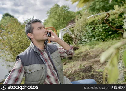 a landscaper over the phone