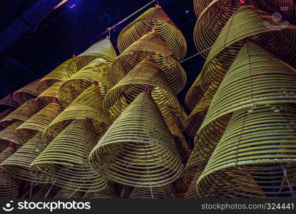 A large incense coil that was burned down from the ceiling of a Chinese Buddhist temple.