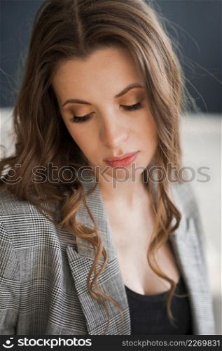 . A large photo of a beautiful girl in a suit 4124.