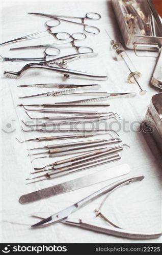 A large set of vintage dental instruments. Vintage dental instruments