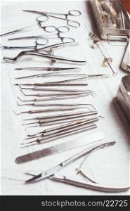 A large set of vintage dental instruments. Vintage dental instruments