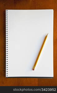 A large spiral bound notebook with blank pages