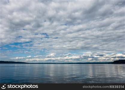 A layer of clouds floast above the Puget Sound in Washington State.