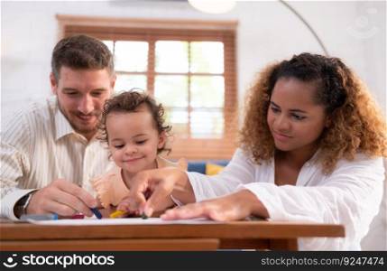 A little child’s imagination is represented through colored pencil drawings, with the parents attentively supervising in the living room of the house.