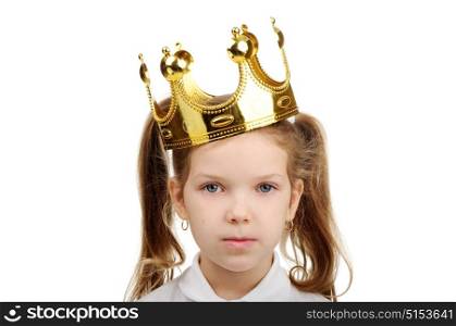 A little girl wears a crown.