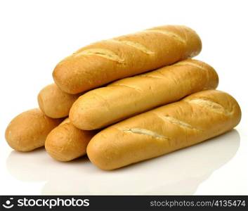 A loaf of fresh baked french or italian bread on a white background