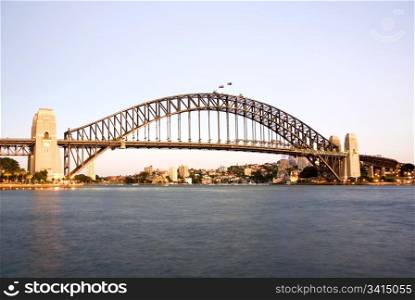 A long exposure capture of Sydney Harbour Bridge at dawn