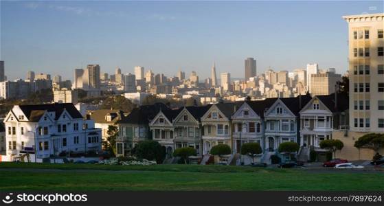 A long horizontal panoramic view of the homes called painted ladies
