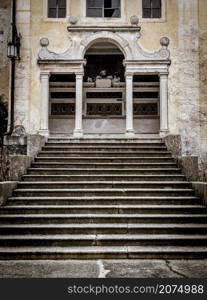 A long stair create the perspective to this 15th century Italian chapel.