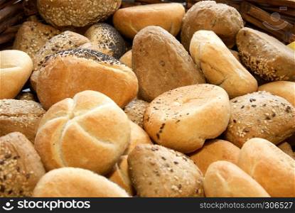 a lot of differentfresh buns from bakery