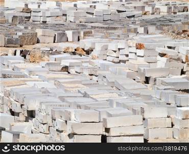 a lot of granite blocks in quarry storage