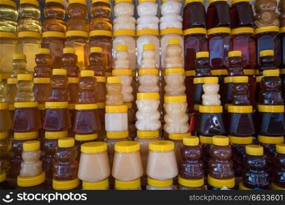 A lot of jars with natural organic honey. Altai region. A lot of jars with natural organic honey