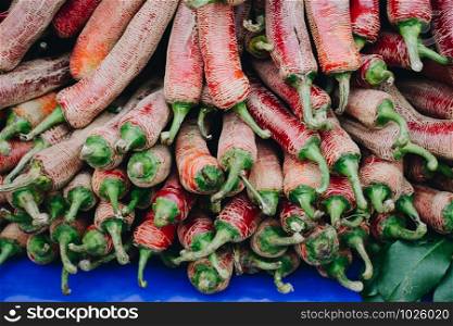 A Lot of Red Chilli Peppers found as food background