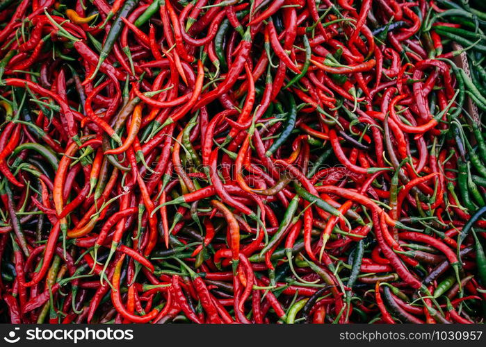 A Lot of Red Chilli Peppers found as food background