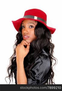 A lovely African American woman in a black blouse and long black curlyhair with a red hat, isolated for white background.