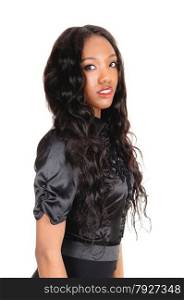 A lovely African American woman in a black blouse and long black curlyhair, isolated for white background.