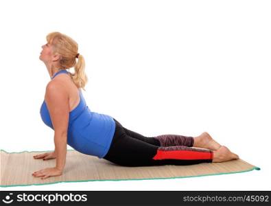 A lovely blond woman in yoga outfit showing some poses for yogastretching, isolated for white background.