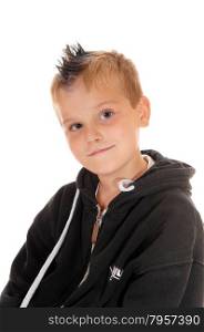 A lovely handsome young boy in a black jacket looking into the camera,isolated for white background.