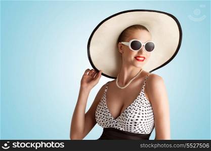 A lovely photo of pin-up girl in vintage hat.