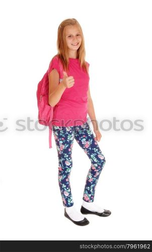 A lovely slim young girl with her backpack on her back standing for whitebackground, smiling and ready to go to school.
