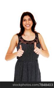 A lovely young woman in a dress standing with her thumbs up, isolatedover white background.