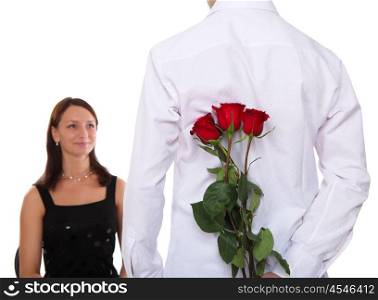 a loving man holding a red roses for his woman