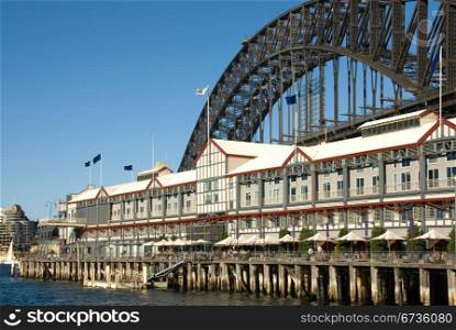 A luxury hotel constructed on a pier, adjacent to the Sydney Harbour Bridge, Australia