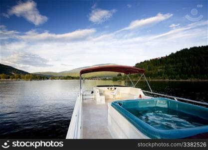 A luxury house boat on a beautiful lake