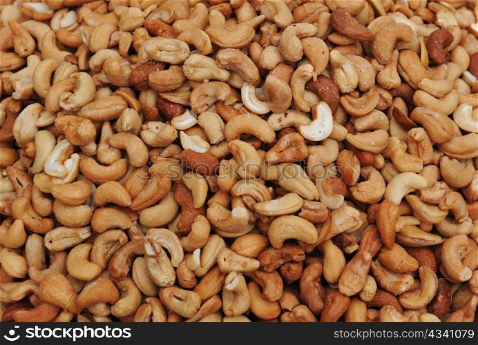 A macro background of healthy cashew nuts.