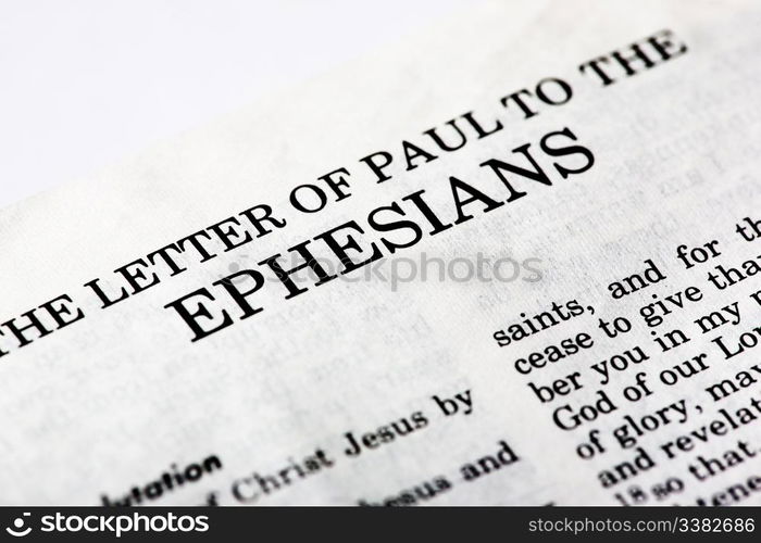 A macro detail of the book of Ephesians in the Christian New Testament