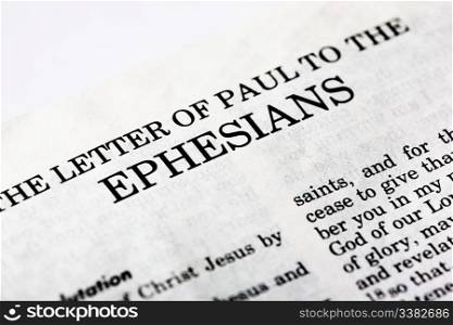 A macro detail of the book of Ephesians in the Christian New Testament