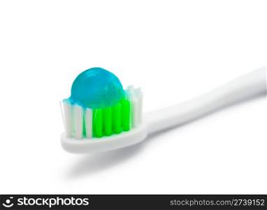 a macro shot of a toothbrush with blue gel toothpaste
