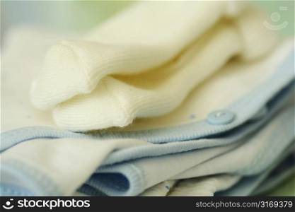 A macro shot of baby clothing and socks