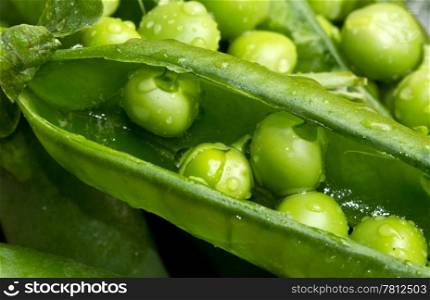 a macro shot of fresh peas