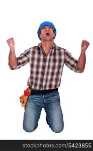 A male construction worker shouting.