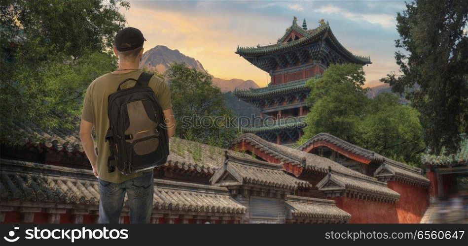 a male tourist is traveling around the Shaolin monastery. China.