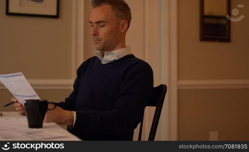 a man balancing his checkbook