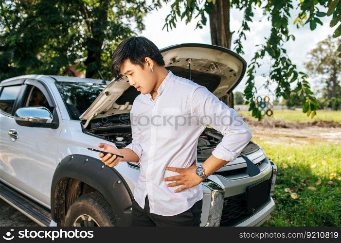 A man called a mechanic to fix the car because the car broke down.