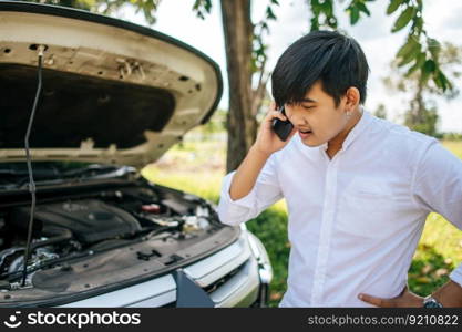 A man called a mechanic to fix the car because the car broke down.