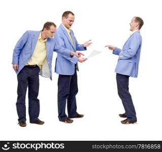 A man, clearly acting irritated, failing to spot the error in the document. The guy behind him is pointing it out, and a man in front is laughing at his blindness, conceptual image for self-critisism