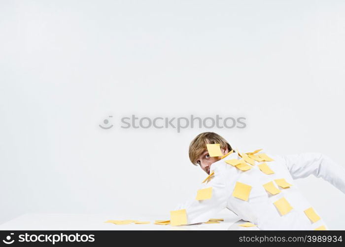 A man covered in adhesive notes