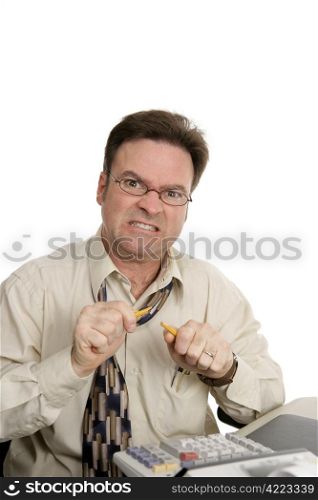 A man doing his own taxes or paying bills and getting very frustrated. Isolated on white.