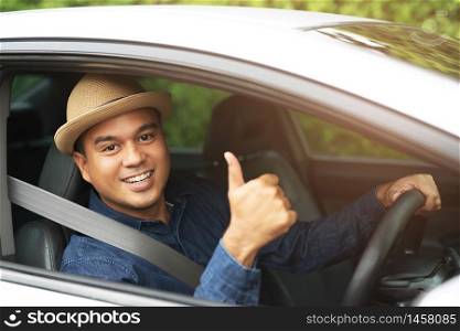 A man driving to travel to work at the office
