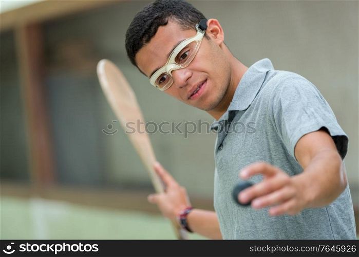 a man during squash game training