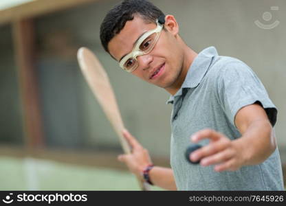 a man during squash game training