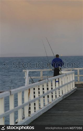 A man fishing by himself