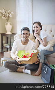 A man giving a present to beautiful woman. man giving a present to woman