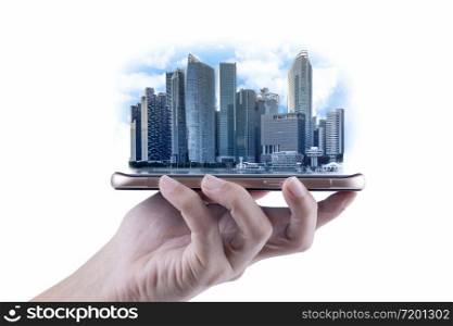 A Man hand holding the modern building of Business financial district and commercial on smartphone , concept of industrial construction and success with technology